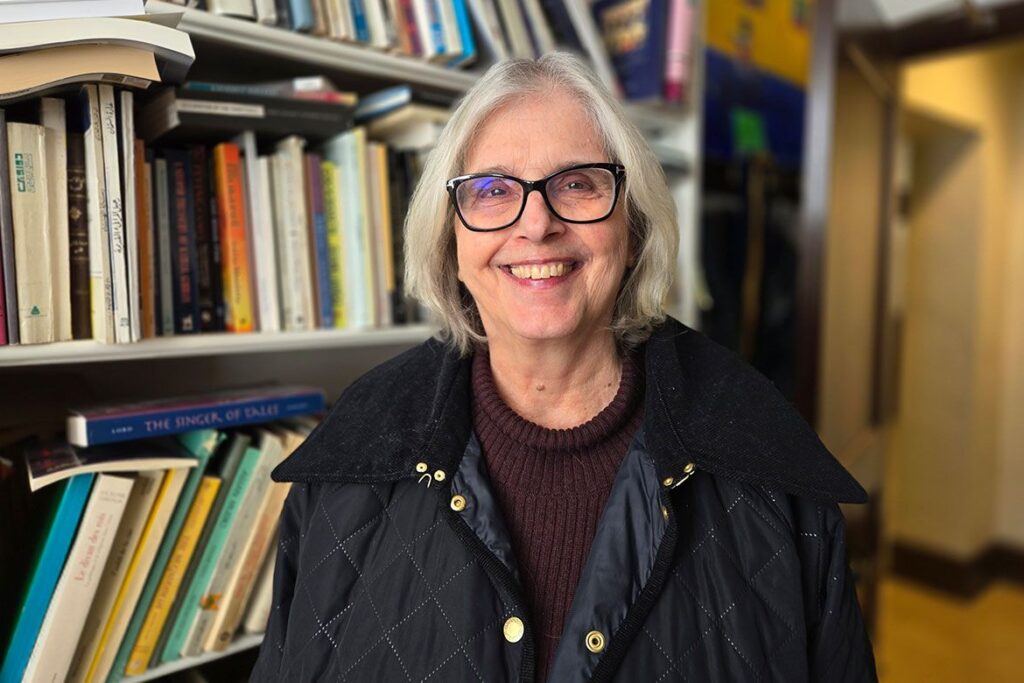 Headshot of Susan Slyomovics in front of a bookshelf