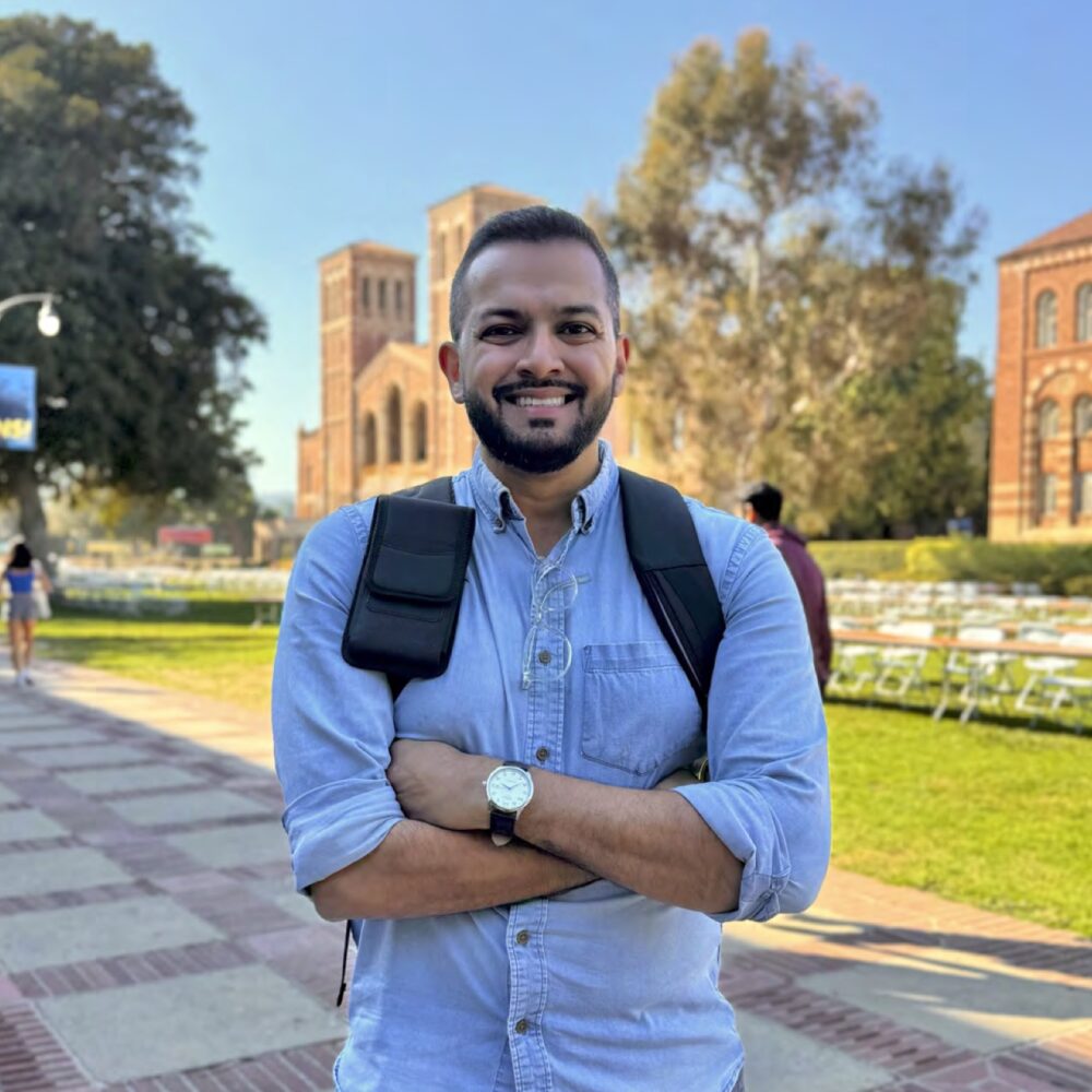 Nihal Khan Headshot on campus with Royce Hall in the background